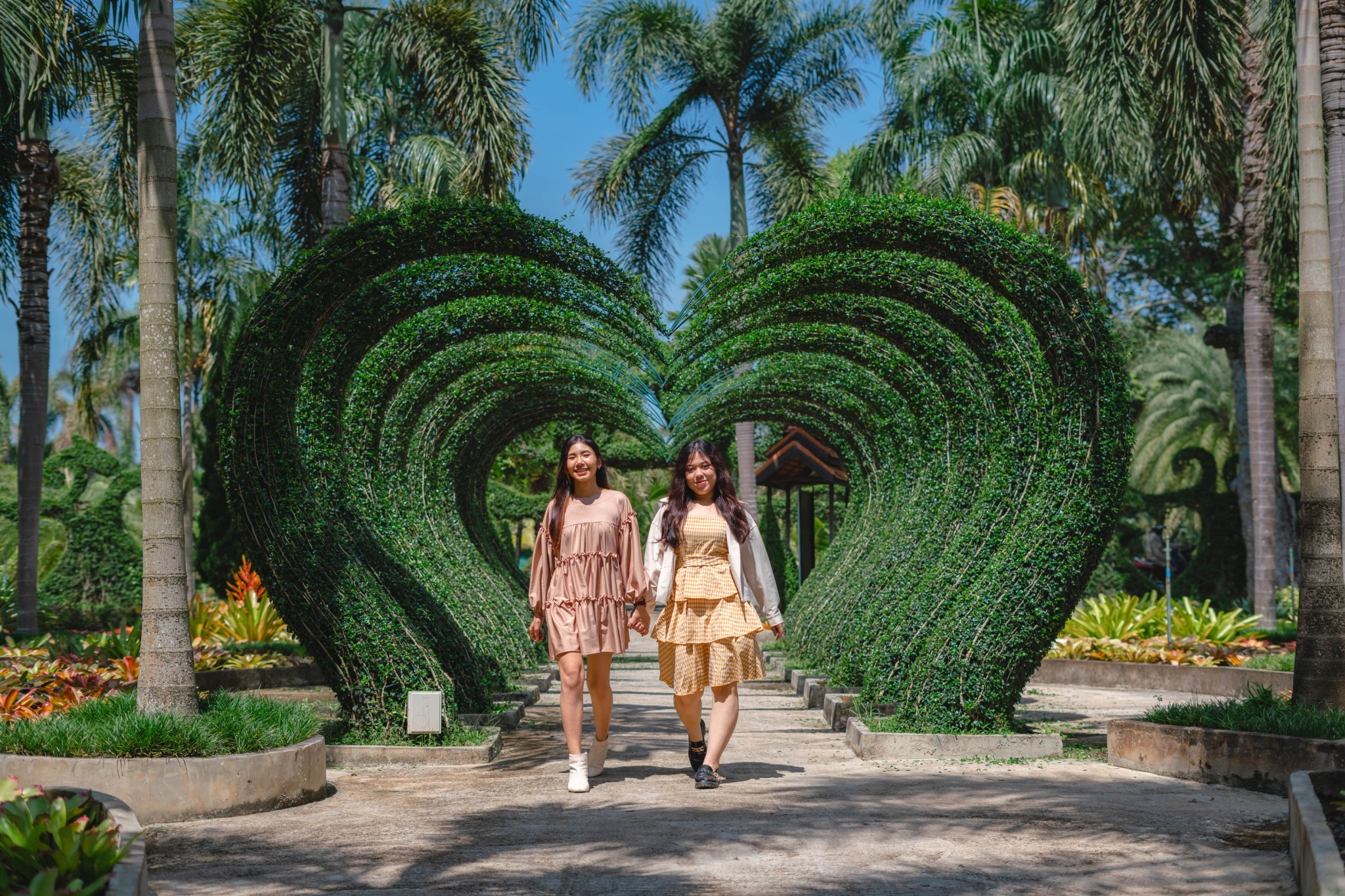 Topiary heart arch — garden walk