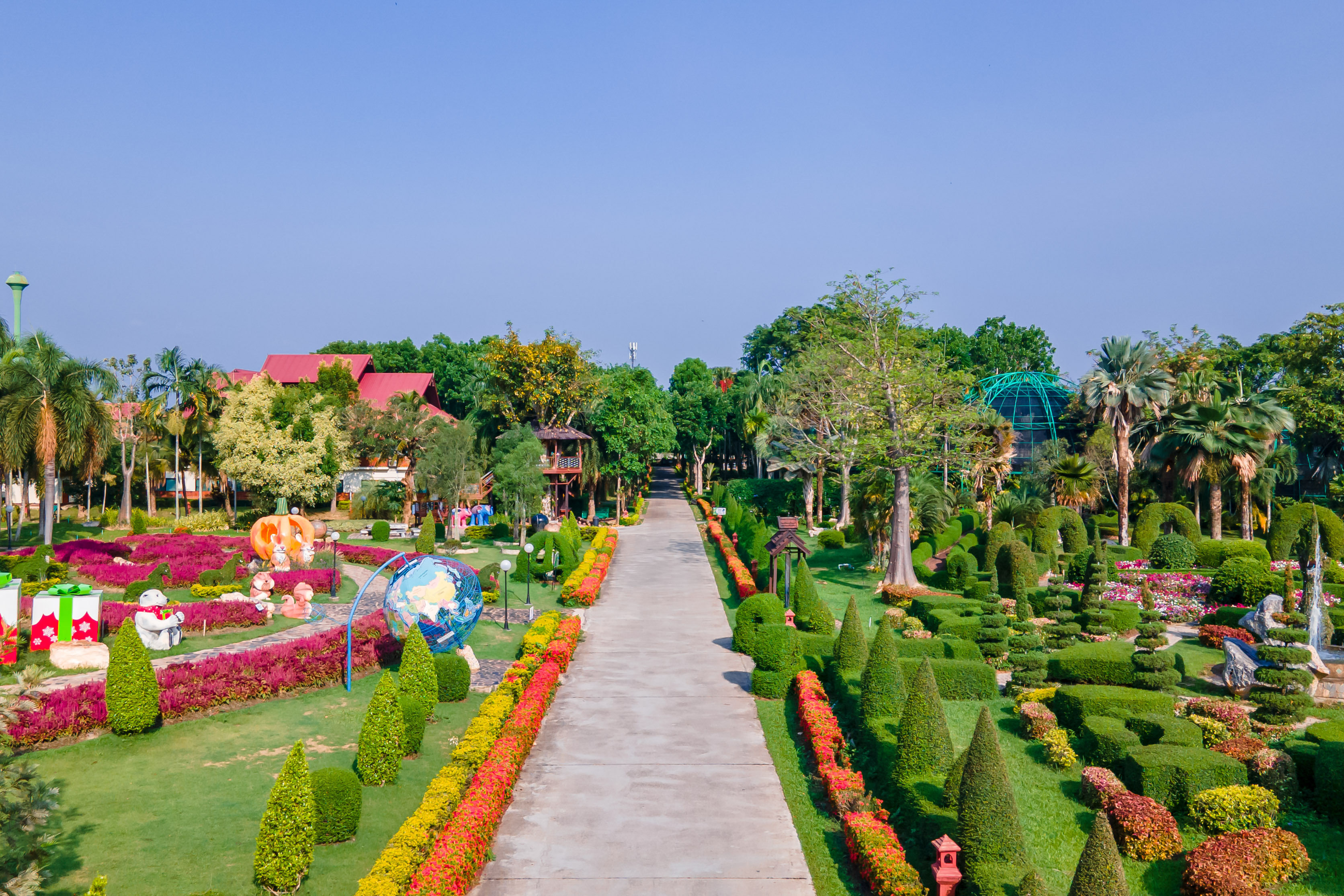 Garden path with topiary and flowers